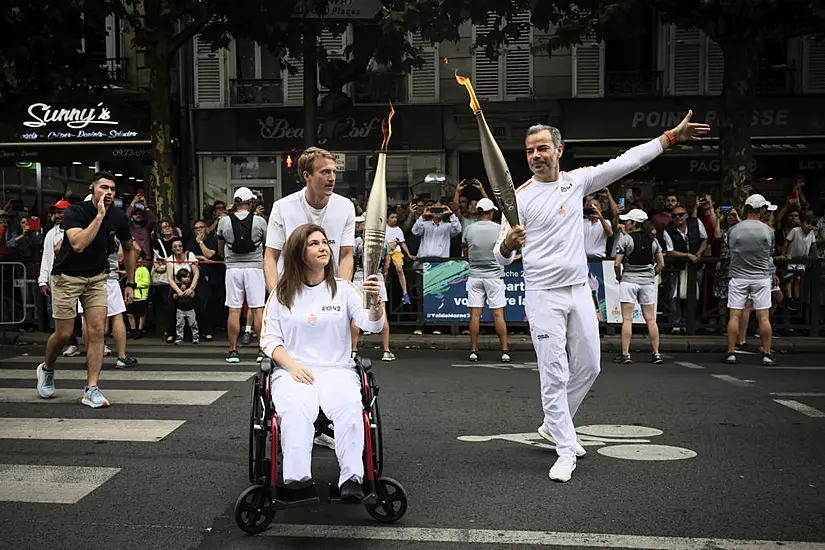 Wounded Lebanese Photojournalist Carries Olympic Torch To Honour Journalists