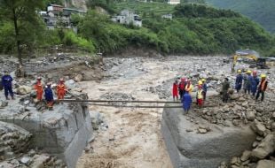Search For Missing After Flooding And Bridge Collapse In China Kill At Least 25
