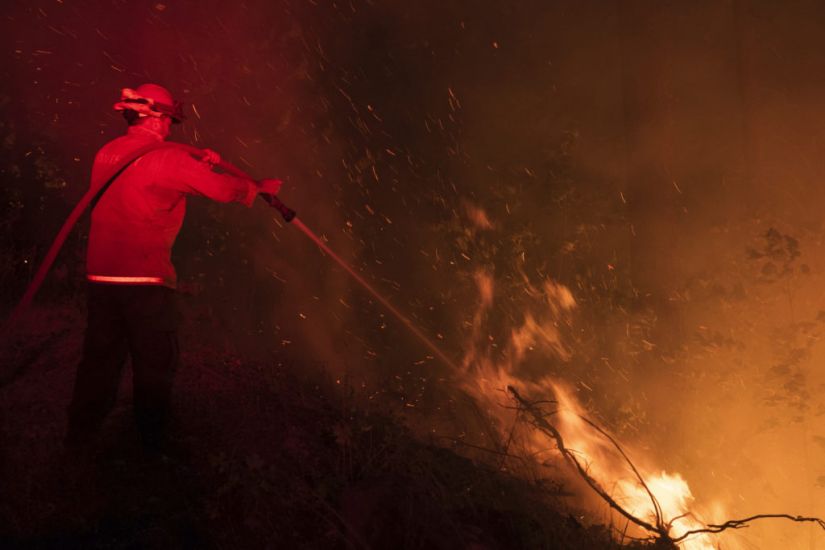 California Firefighters Make Progress Amid Blaze Devastation