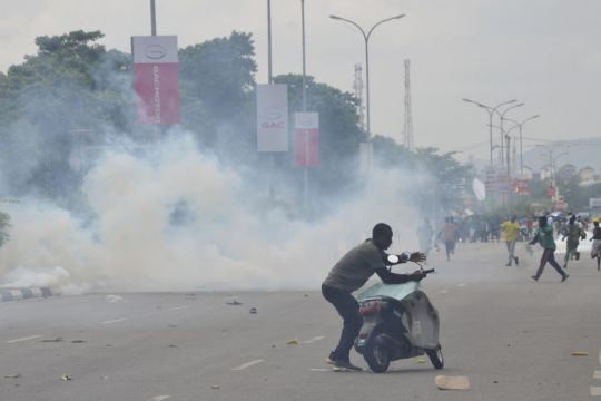 Nigerian Leader Demands End To Protests Over Hardship Which Have Turned Violent