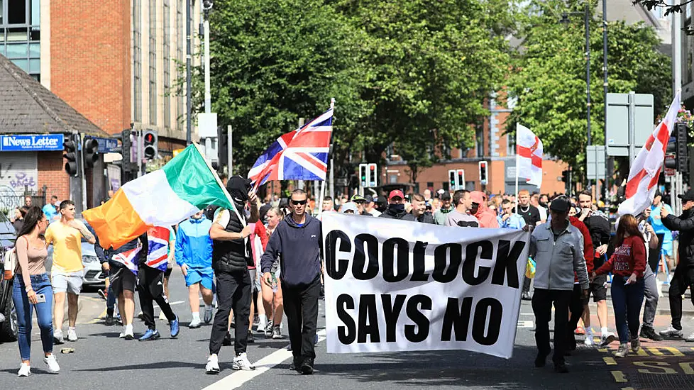 Simon Harris Expresses ‘Disgust’ At Tricolour Flown During Attacks On Police In Belfast