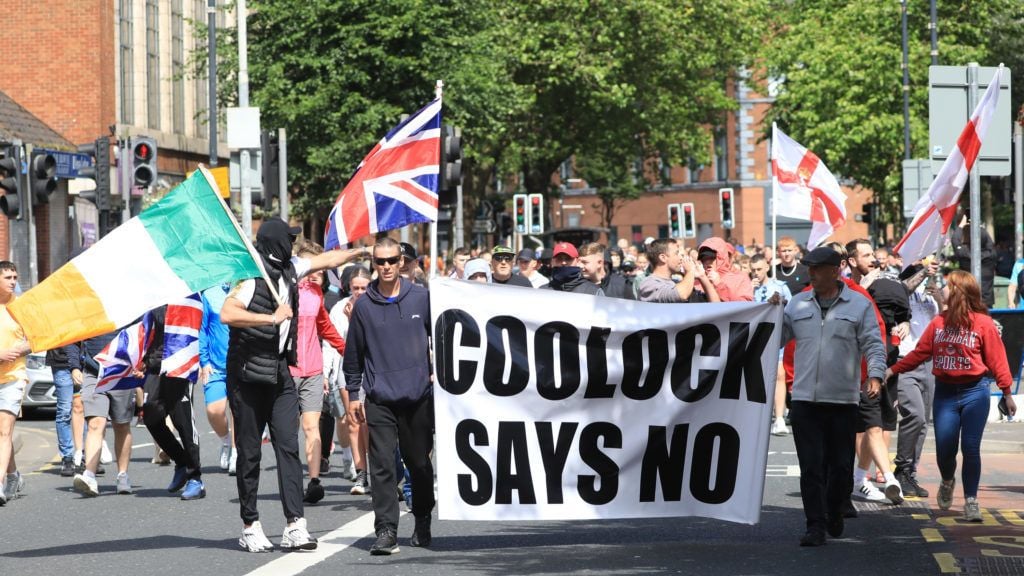 Taoiseach criticises those who ‘hijacked’ Tricolour at Belfast anti-immigration protest