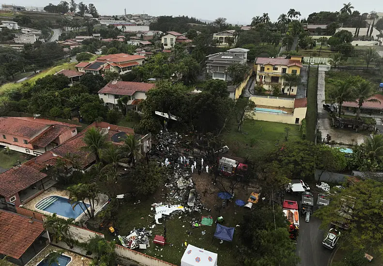 Families Of Brazilian Plane Crash Victims Gather In Sao Paulo