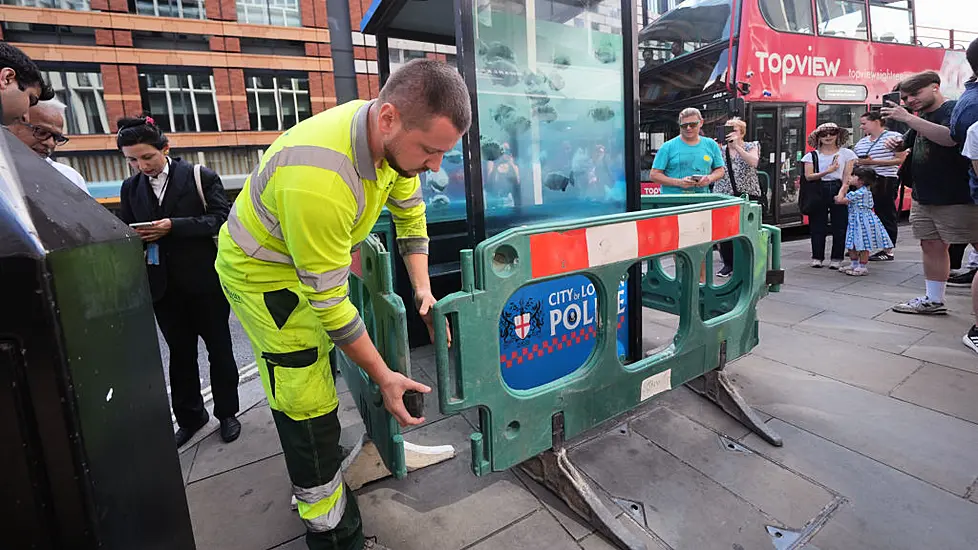 Barriers Erected Around Banksy’s New Piranha Artwork On London Police Box