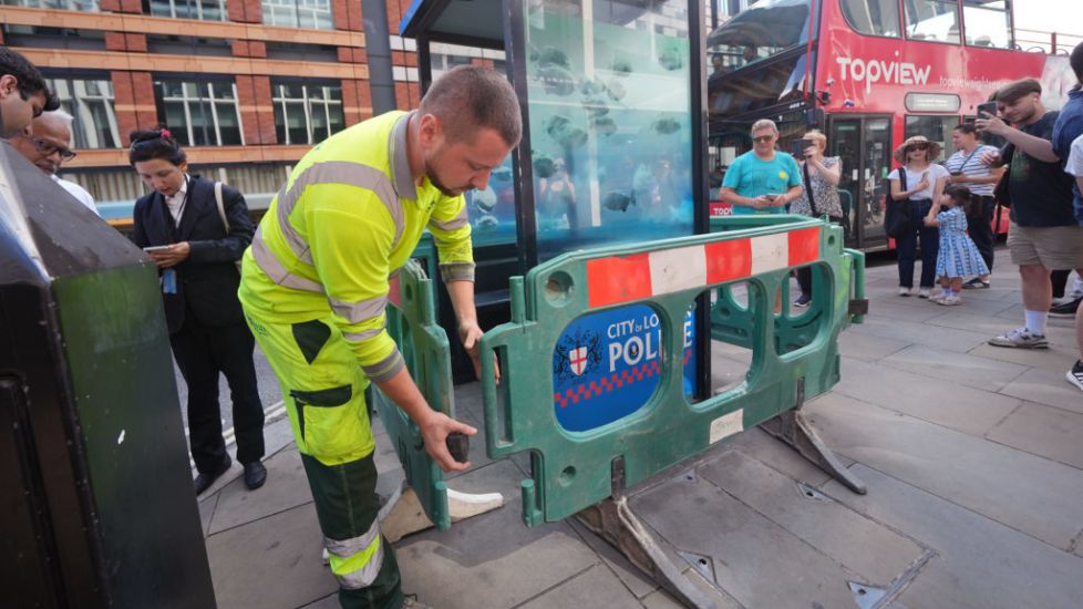 Barriers Erected Around Banksy’s New Piranha Artwork On London Police Box