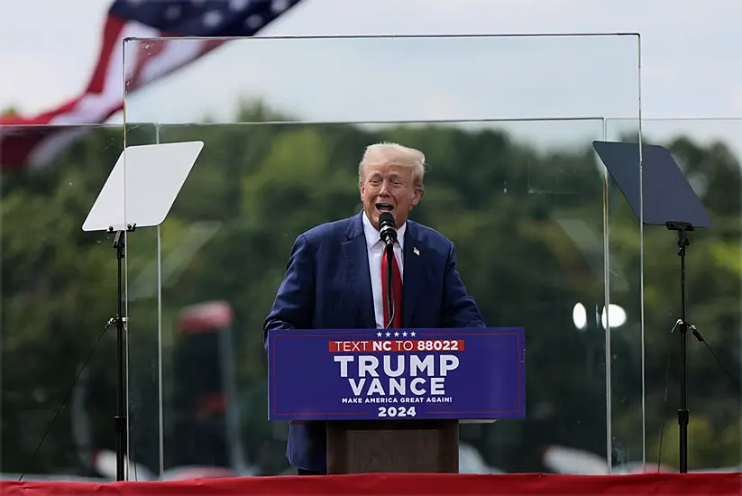 Trump Appears Behind Bulletproof Glass At First Outdoor Rally Since Shooting