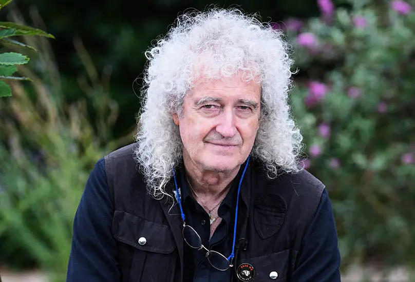 Queen Guitarist Brian May Says He Had A ‘Minor Stroke’