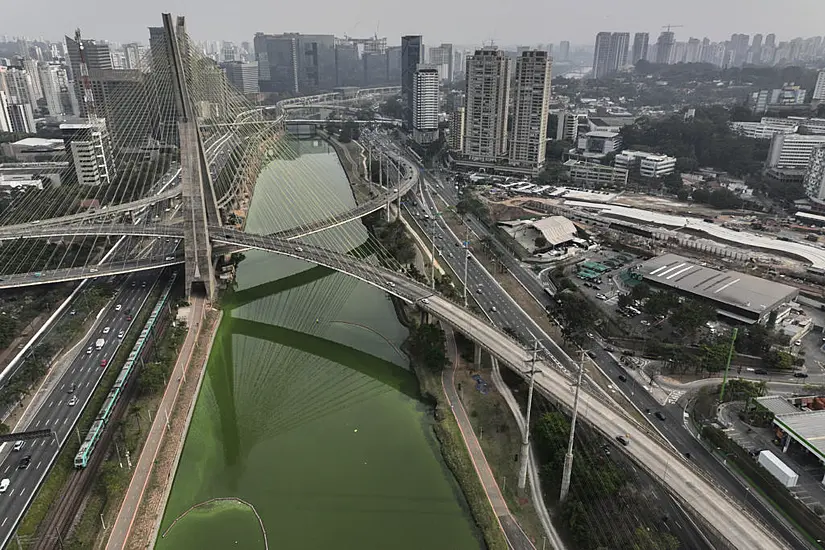 Sao Paulo River Turns Emerald Green As Drought Continues