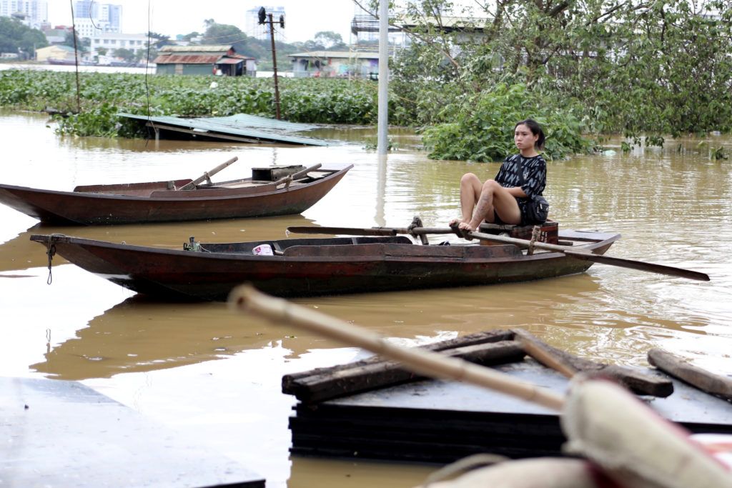 Flash flood sweeps away hamlet as Vietnam storm death toll rises