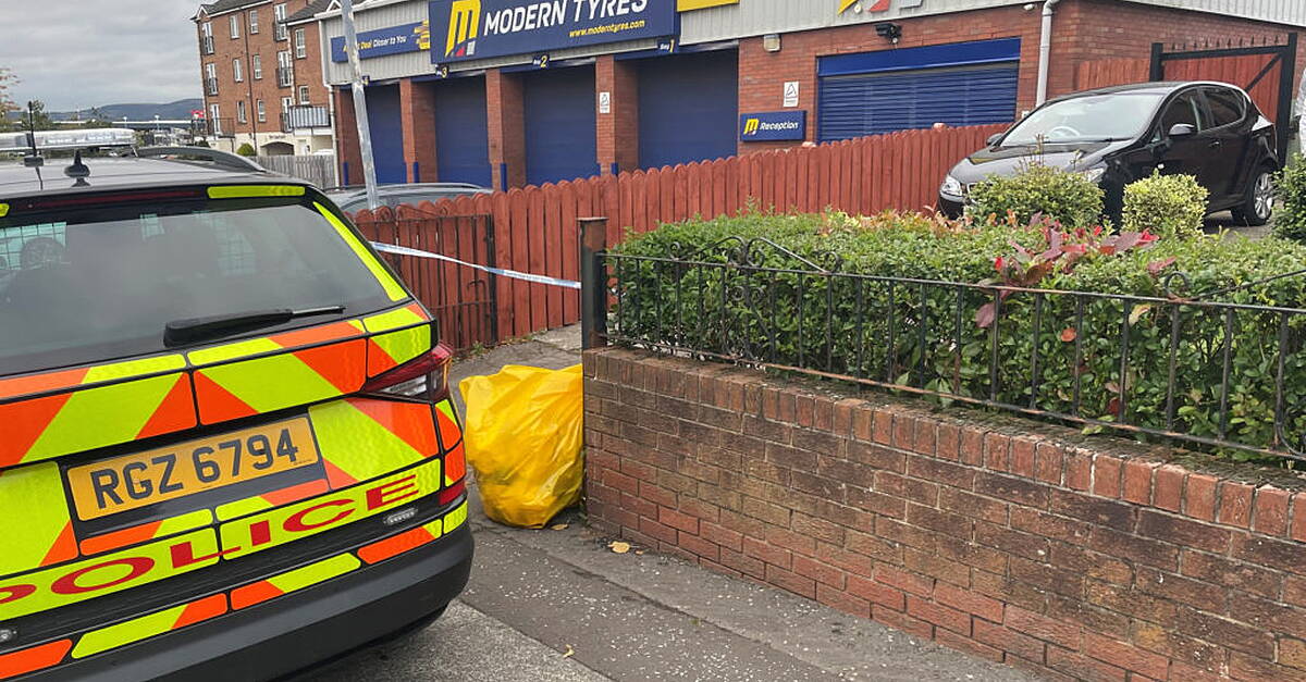 Murder hunt launched after woman’s body found in garage in Belfast