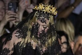 Madonna Makes Veiled Entrance To Dolce &Amp; Gabbana For Show Marking 1990S Heyday