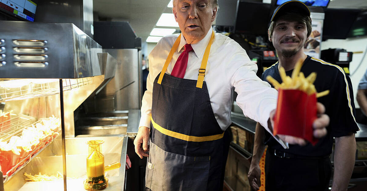 Donald Trump hands out fries and holds drive-thru news conference at McDonald’s