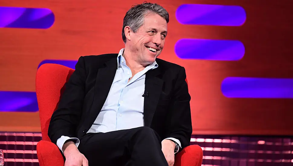 Hugh Grant On Doing Shots With Travis Kelce At Taylor Swift Gig: We Went Crazy