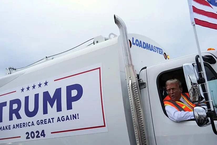 Trump Boards Garbage Truck To Highlight Biden Remark