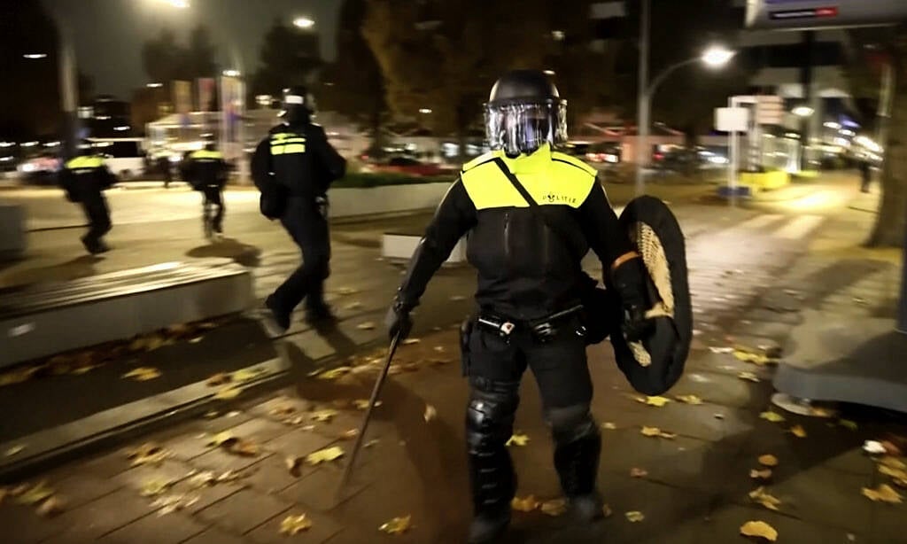 Amsterdam police warn of fresh calls for unrest a day after rioters torch tram