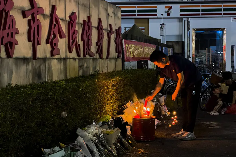 Public Mourns 35 Killed In Attack At Sports Complex In Southern Chinese City