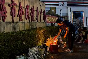 Public Mourns 35 Killed In Attack At Sports Complex In Southern Chinese City