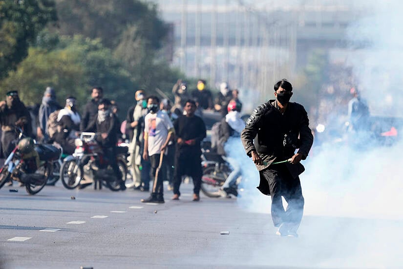 At Least Six Killed In Violence As Khan Supporters Breach Islamabad Lockdown