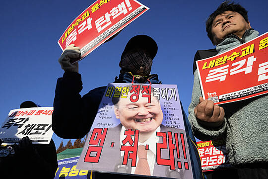 South Korea’s Leader Urged To Resign Or Face Impeachment Over Martial Law Decree