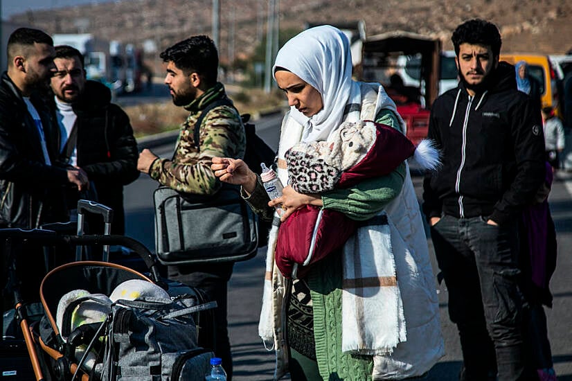 Hundreds Of Syrians Line Up At Turkish Border Crossing Awaiting Return Home