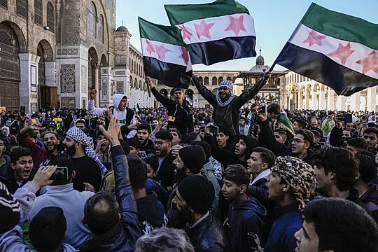 Thousands Gather In Damascus To Celebrate The Toppling Of Assad Regime