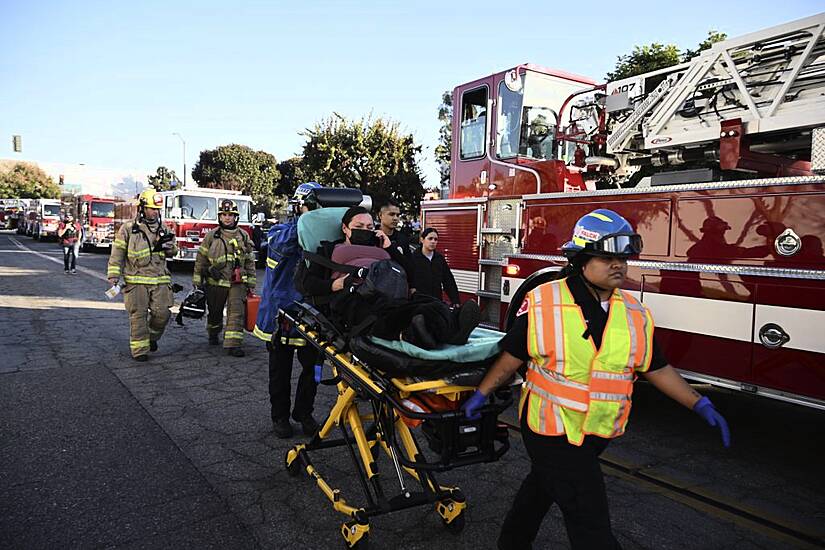 Two People Killed As Small Plane Crashes Into Warehouse