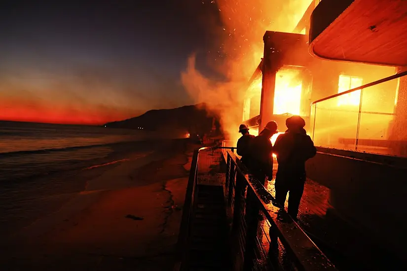 Firefighters Make Progress In Slowing Los Angeles Wildfires Amid Devastation