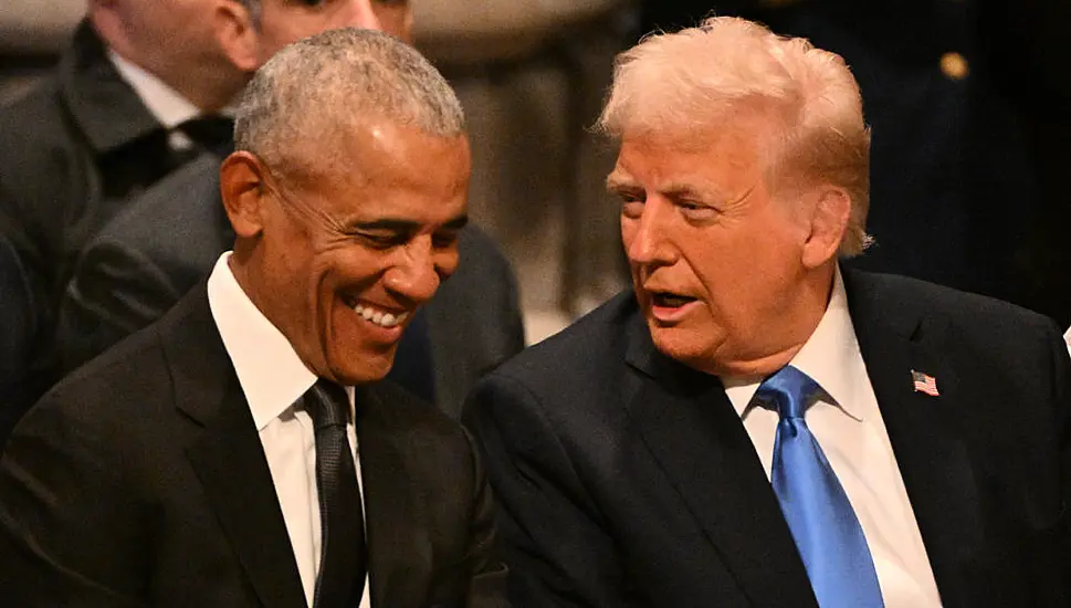 Trump Shakes Hands With Pence, Engages Obama At Carter Funeral