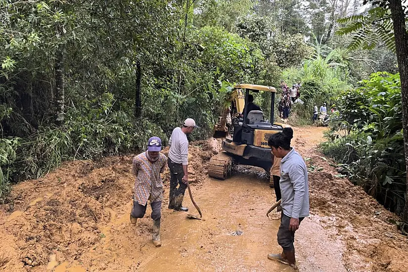 Death Toll In Deadly Flooding And Landslides In Indonesia Rises To 21