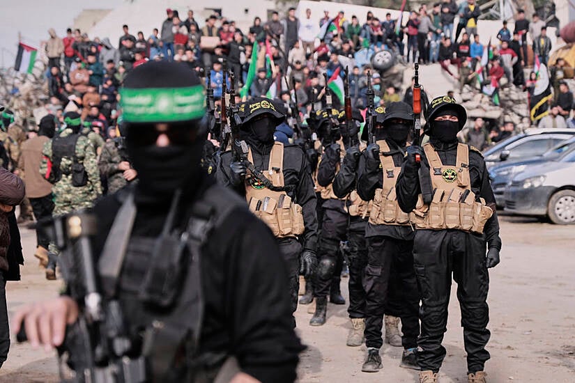 Hamas Hands Over Israeli Hostages After Parading Them In Front Of Crowd