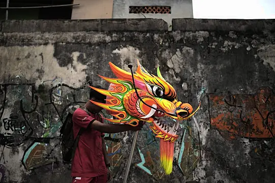 In Pictures: Indonesia Welcomes The Year Of The Snake With Dragons And Drums