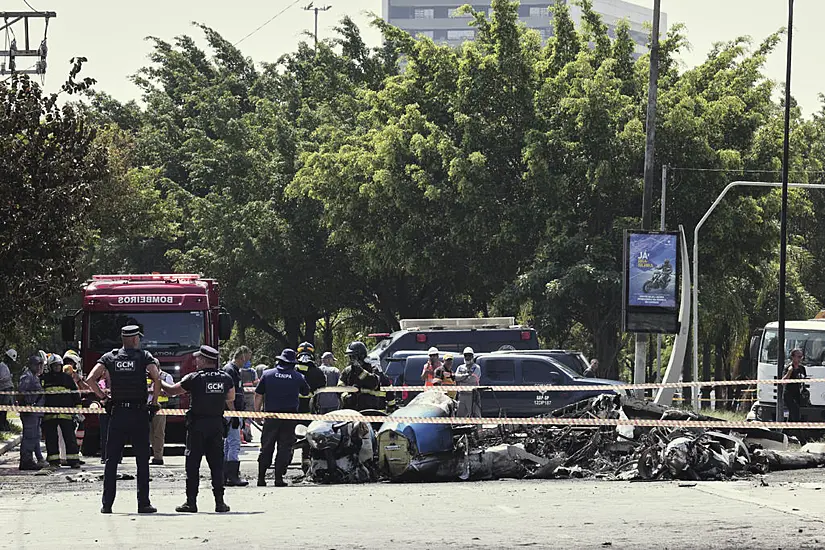 Small Plane Crashes Into Traffic In Brazilian City Of Sao Paulo