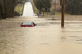 Flooding Leaves Two Dead In Kentucky As Snow And Ice Cause Misery Elsewhere