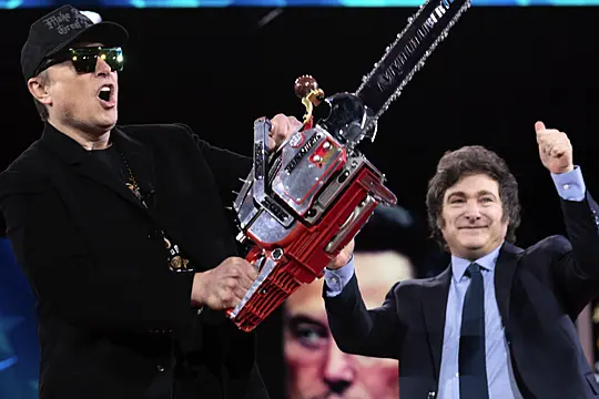 Musk Wields Chainsaw On Stage At Conservative Conference