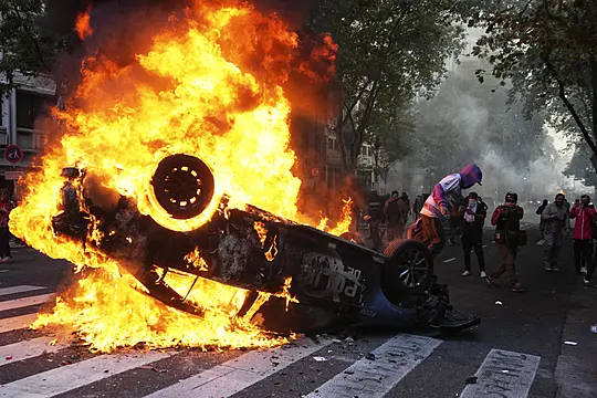 Argentine Retirees And Soccer Fans Clash With Police During Protests