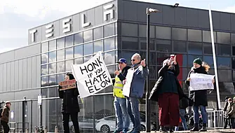 Protesters Gathered Outside London Tesla Dealership Call For Boycott