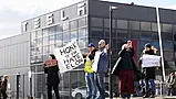 Protesters Gathered Outside London Tesla Dealership Call For Boycott