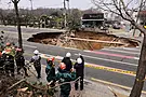 Motorcyclist Who Disappeared Into Huge Seoul Sinkhole Found Dead