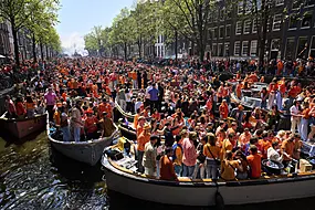 Orange-Clad Crowds Cram Into Dutch Cities To Celebrate King’s Birthday