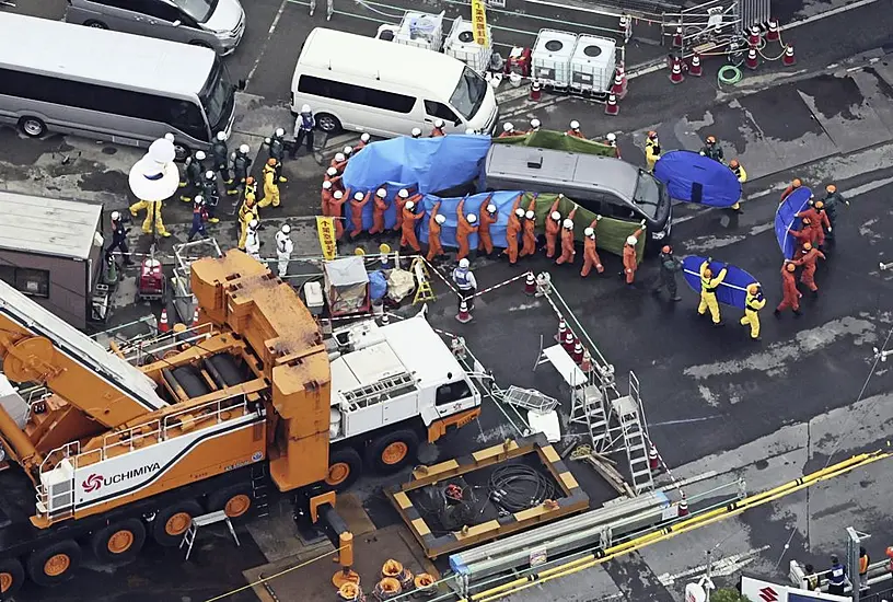 Body Of Truck Driver Whose Vehicle Fell Into Sinkhole In Japan Is Recovered