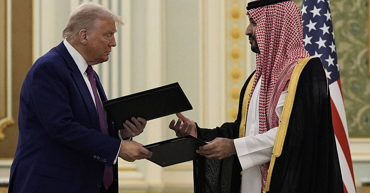 Trump and Saudi prince sign agreements as US leader begins Middle East tour