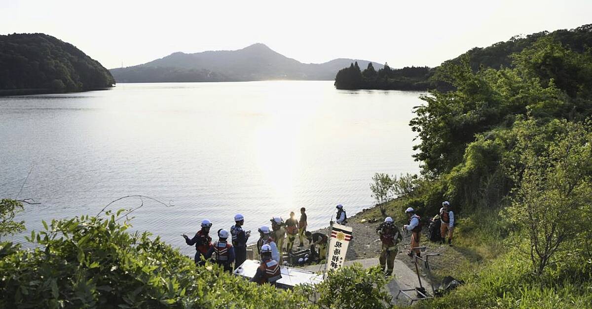 Japan retrieves body of one of two service members whose training plane crashed