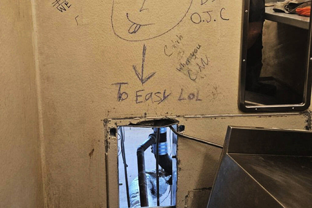Ten escape from New Orleans jail through hole in cell wall