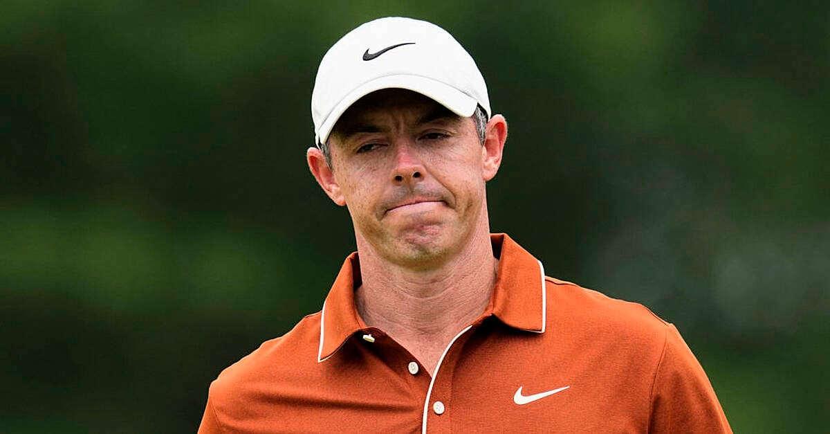 Rory McIlroy faced a lengthy wait to resume his bid