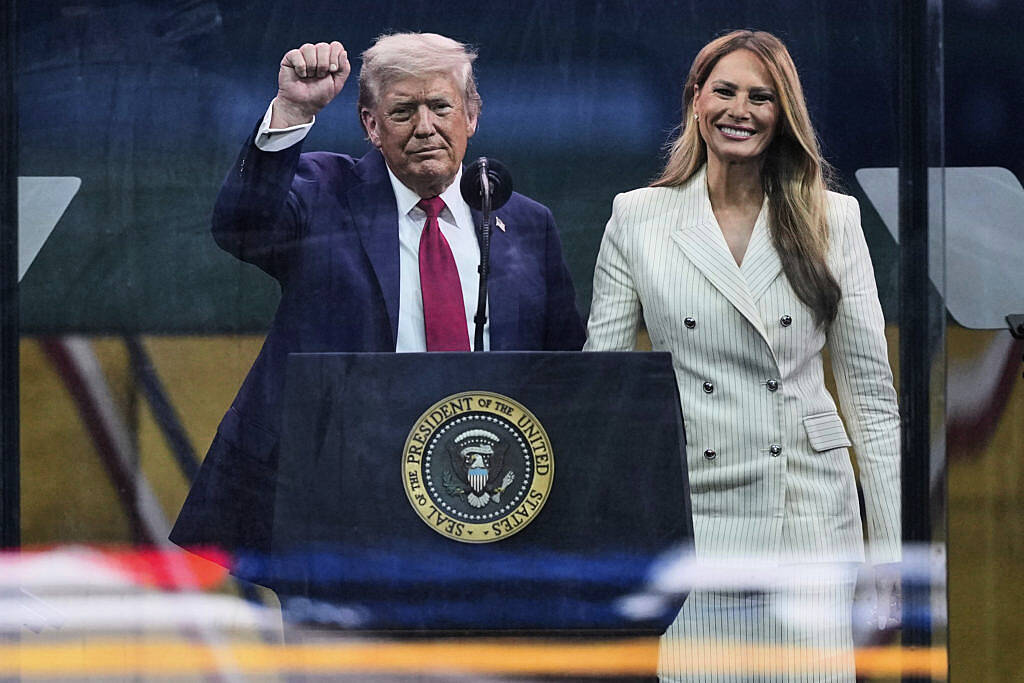 Military parade rolls through Washington as protesters across US decry Trump