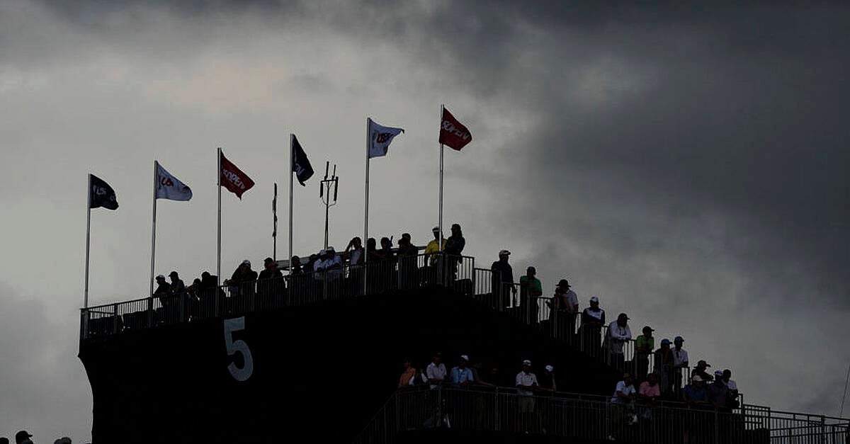 Heavy rain halts play at US Open with overnight leader Sam Burns still ahead