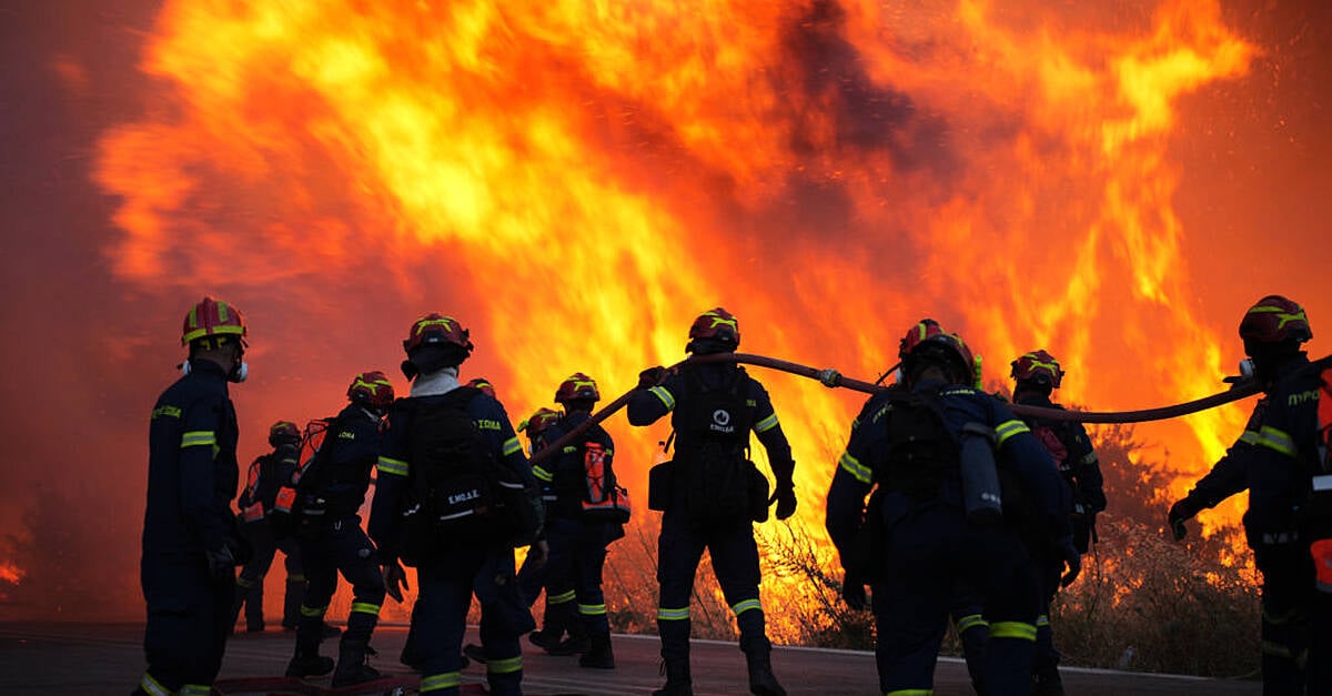 More than 100 firefighters assisted by water dropping helicopters and