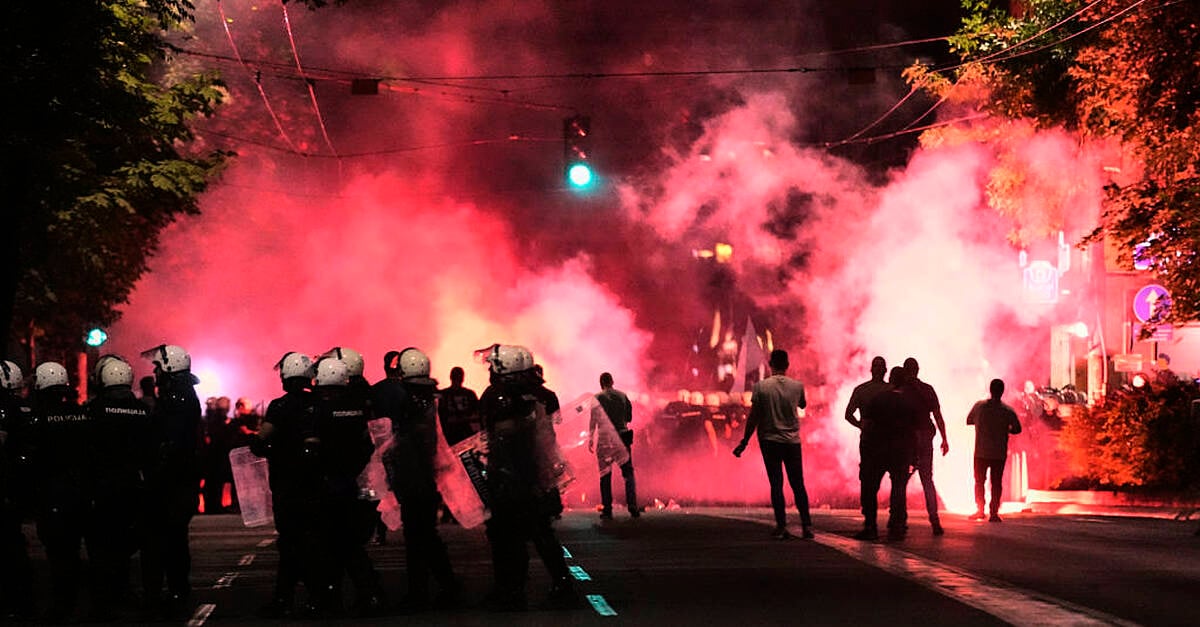 Serbian riot police fire tear gas at anti-government protesters