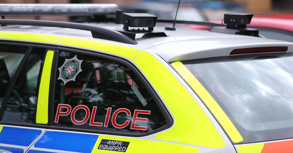Man held on suspicion of attempted murder after police car driven at ...