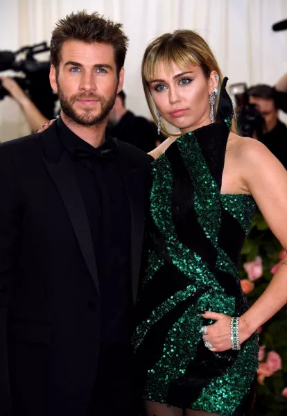 Miley Cyrus and Liam Hemsworth (Jennifer Graylock/PA)